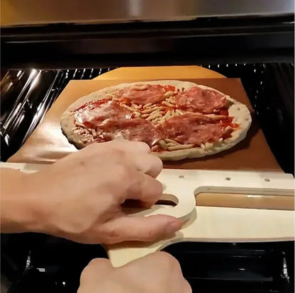 Sliding pizza peel with foldable handle